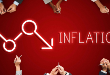 red inflation table with business people's hands