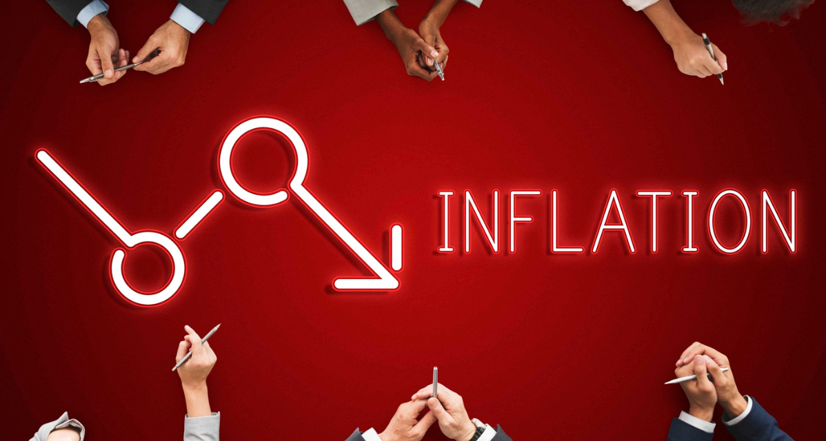 red inflation table with business people's hands